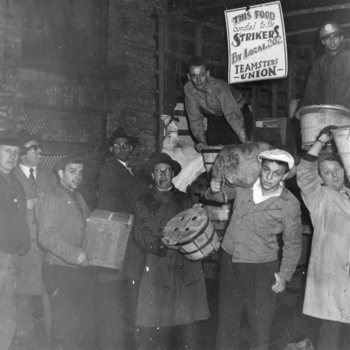 Seafarers carrying donated food